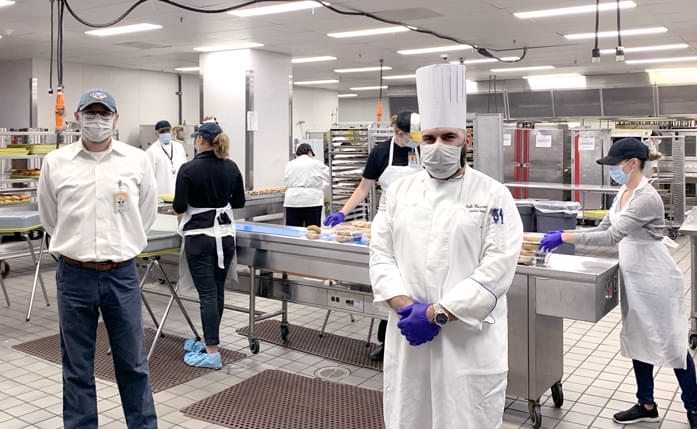 Centerplate staff in kitchen wearing masks